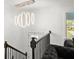 Staircase with railing and modern chandelier at 2120 Pair Sw Rd, Marietta, GA 30008