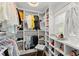 Organized walk-in closet with shelving, hanging racks, and shoe storage at 2120 Pair Sw Rd, Marietta, GA 30008