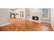 Open-concept living space with fireplace and view into the modern kitchen at 2164 Caneridge Sw Dr, Marietta, GA 30064