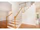 Spacious entryway with a wooden staircase, hardwood floors, and lots of natural light at 2164 Caneridge Sw Dr, Marietta, GA 30064