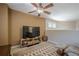 Comfortable bonus room with mounted television and space for relaxing and recreation at 235 Cornerstone Dr, Woodstock, GA 30188