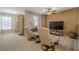 Upstairs bonus room features great natural lighting and space for entertaining at 235 Cornerstone Dr, Woodstock, GA 30188