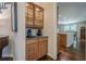 This home features a beautiful coffee bar with custom cabinets and granite countertops at 235 Cornerstone Dr, Woodstock, GA 30188
