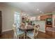 This home features a formal dining area near the gourmet kitchen with seating for four at 235 Cornerstone Dr, Woodstock, GA 30188