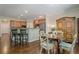 This home features a formal dining area adjacent to the kitchen with seating for four at 235 Cornerstone Dr, Woodstock, GA 30188