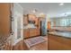 The gourmet kitchen includes stainless steel appliances, granite countertops, and a separate pantry at 235 Cornerstone Dr, Woodstock, GA 30188