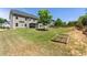 Large grassy backyard featuring a lush lawn, shade trees, gazebo and a small garden plot at 3051 Mountain Shadow Way, Marietta, GA 30064