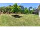 A large backyard features a lush lawn and an inviting gazebo for outdoor relaxation and entertaining at 3051 Mountain Shadow Way, Marietta, GA 30064