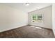 Bedroom with carpet and a large window for natural light at 3051 Mountain Shadow Way, Marietta, GA 30064