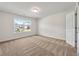 Neutral bedroom with carpet, a ceiling light, and a window view at 3051 Mountain Shadow Way, Marietta, GA 30064