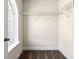 Walk-in closet features carpeted floors, white walls, and wire shelving for optimal storage in a well lit area at 3051 Mountain Shadow Way, Marietta, GA 30064