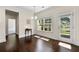 Dining room features hardwood floors and a view of the backyard at 3051 Mountain Shadow Way, Marietta, GA 30064