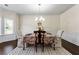 Formal dining room with elegant decor and natural light from the large windows at 3051 Mountain Shadow Way, Marietta, GA 30064