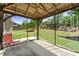 Backyard gazebo offers an outdoor retreat, featuring a comfortable chair, and screen for bug free relaxation at 3051 Mountain Shadow Way, Marietta, GA 30064
