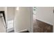 Hallway with access to carpeted room featuring dark wood stairs at 3051 Mountain Shadow Way, Marietta, GA 30064