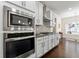 Gourmet kitchen showcases stainless steel appliances and ample cabinet space at 3051 Mountain Shadow Way, Marietta, GA 30064