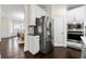 Well-equipped kitchen features stainless steel refrigerator and built-in microwave at 3051 Mountain Shadow Way, Marietta, GA 30064