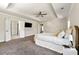 Spacious main bedroom features a trey ceiling, plush carpeting, and ensuite bathroom at 3051 Mountain Shadow Way, Marietta, GA 30064
