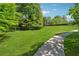 A walking path through green space gives residents easy access to community amenities at 579 Delphinium Nw Blvd, Acworth, GA 30102