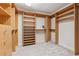 Well-organized walk-in closet with custom shelving and ample storage space at 579 Delphinium Nw Blvd, Acworth, GA 30102