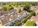 Aerial shot of townhouses, displaying the roofs and surrounding streets at 735 Neel Reid Dr, Roswell, GA 30075