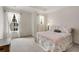Charming bedroom with two large windows, natural light, and warm decor at 735 Neel Reid Dr, Roswell, GA 30075