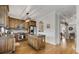 Well-equipped kitchen with wooden cabinetry, granite countertops, and stainless steel appliances at 735 Neel Reid Dr, Roswell, GA 30075