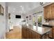 Bright kitchen with granite counters, stainless appliances, and breakfast area seating at 735 Neel Reid Dr, Roswell, GA 30075