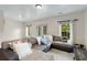 Bright living room with a large sectional couch and natural light at 735 Neel Reid Dr, Roswell, GA 30075