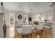Inviting living room boasts hardwood floors, neutral decor, and ample natural light at 735 Neel Reid Dr, Roswell, GA 30075