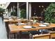 Sidewalk cafe with outdoor seating, tables, and chairs for a relaxing dining experience at 735 Neel Reid Dr, Roswell, GA 30075