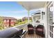 Outdoor patio sitting area with grill and furniture overlooking the neighborhood at 735 Neel Reid Dr, Roswell, GA 30075