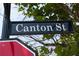 A Canton Street sign indicates the location of a vibrant neighborhood at 735 Neel Reid Dr, Roswell, GA 30075