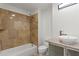 Bathroom featuring stylish tile, shower, bath and vessel sink at 1261 Lavista Rd # C3, Atlanta, GA 30324
