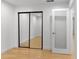 Bedroom featuring a mirrored closet and access to another room at 1261 Lavista Rd # C3, Atlanta, GA 30324