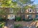Charming two-story brick home with a welcoming entrance and lush landscaping at 1261 Lavista Rd # C3, Atlanta, GA 30324