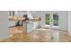 Modern kitchen featuring white cabinets, stainless appliances, and eat in area at 1261 Lavista Rd # C3, Atlanta, GA 30324