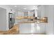 Modern kitchen featuring white cabinets, stainless appliances, and tile backsplash at 1261 Lavista Rd # C3, Atlanta, GA 30324