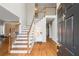 Grand foyer with hardwood floors, a staircase, and a view of the second story at 1988 Claiborne Ct, Marietta, GA 30062