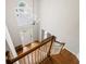 Open foyer with staircase and large window, showcasing ample natural light at 1988 Claiborne Ct, Marietta, GA 30062