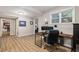 Basement office with neutral walls, updated flooring, and great light from the window at 1988 Claiborne Ct, Marietta, GA 30062