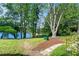 Spacious backyard with mature trees and peaceful lake view at 2495 Northlake Ne Ct, Atlanta, GA 30345