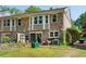 Charming brick townhome with well-manicured landscaping and inviting backyard patio at 2495 Northlake Ne Ct, Atlanta, GA 30345