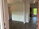 Welcoming entryway with wood-look floors and white wainscoting leading into the home at 4120 Chapel Hill Reserve, Douglasville, GA 30135