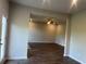 Open-concept living room featuring hardwood floors and a ceiling fan at 4120 Chapel Hill Reserve, Douglasville, GA 30135