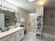 Bright bathroom featuring a tub, shower, vanity with white sink, and plenty of storage at 4409 Deborahs Ct # 0, Union City, GA 30291