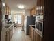 Modern kitchen with stainless steel appliances, oak cabinets, and a cozy breakfast area at 4409 Deborahs Ct # 0, Union City, GA 30291