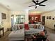 Comfortable living room with a plush sofa, a ceiling fan, and a view into the adjacent dining area at 4409 Deborahs Ct # 0, Union City, GA 30291