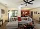 Cozy living room with a comfortable sectional sofa, ceiling fan and access to the patio at 4409 Deborahs Ct # 0, Union City, GA 30291