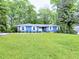 Attractive home with a well-maintained front yard and manicured landscaping at 4579 Amberly S Ct, Atlanta, GA 30360